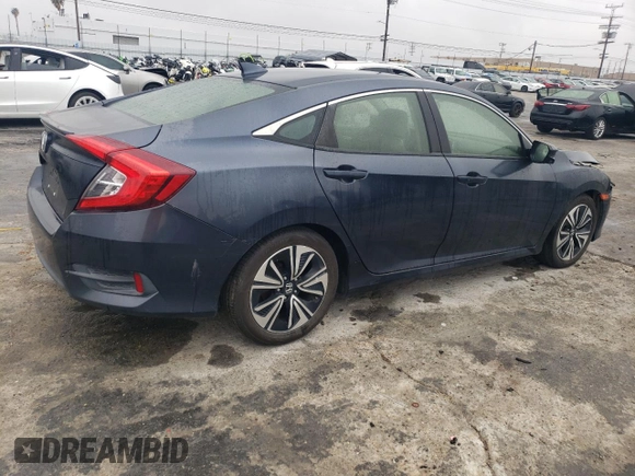 2018 Honda Civic EX-T z VIN JHMFC1F32JX006088, wystawiony jako Copart lot #50563105 z przebiegiem 117 744 mil mil oraz Szkoda całkowita • Salvage title. Historia ofert i sprzedaży dostępna na DreamBid. Obrazek 3.