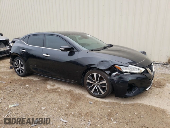 2021 Nissan Maxima SV с VIN 1N4AA6CV0MC507177, выставлен на аукционе Copart как лот 38932754 с пробегом 50 219 миль миль и Списание • Salvage title. История ставок и продаж доступна на DreamBid. Изображение 4.