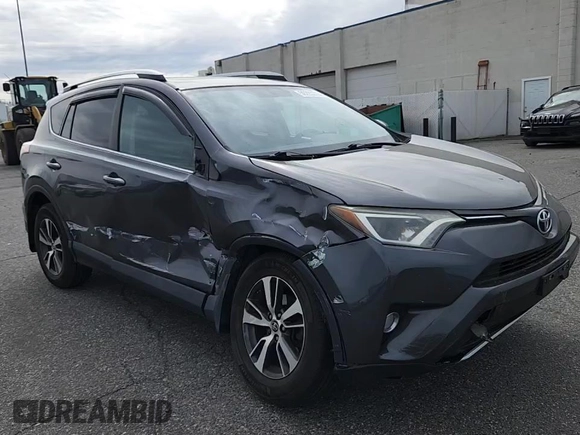 2016 Toyota RAV4 XLE with VIN 2T3RFREV6GW451194, listed as a Copart auction lot 59293325 with 168,739 mi miles and Salvage title. Bid and sale history available at DreamBid. Image 14.