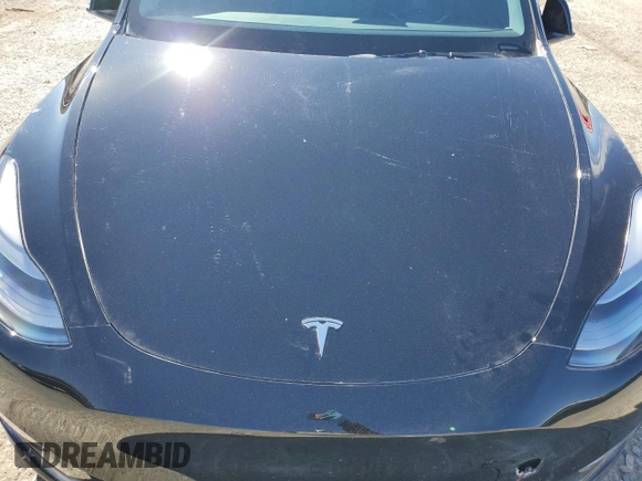 2023 Tesla Model Y Performance with VIN 7SAYGDEF8PF925238, listed as a Copart auction lot 46276925 with 28,201 mi miles and Salvage Title. Bid and sale history available at DreamBid. Image 11.