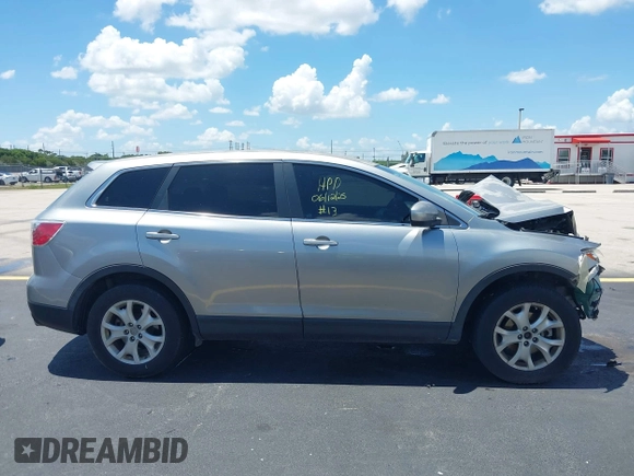 2011 Mazda CX-9 Sport with VIN JM3TB2BA3B0308508, listed as a IAAI auction lot 42517371 with 139,986 mi miles and . Bid and sale history available at DreamBid. Image 14.