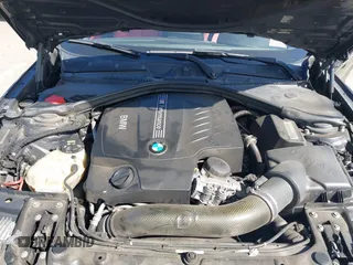 2014 BMW 2 Series M235i with VIN WBA1J7C51EVX33702, listed as a IAAI auction lot 41713337 with 83,076 mi miles. Bid and sale history available at carsss.com. Image 10.