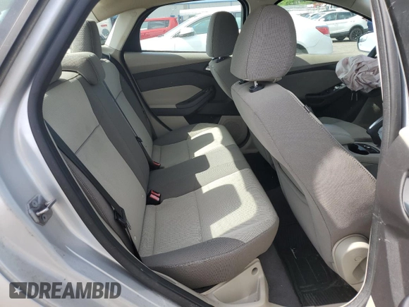 2013 Ford Focus SE z VIN 1FADP3F24DL193495, wystawiony jako Copart lot #57796005 z przebiegiem 178 621 mil mil oraz Tytuł czysty. Historia ofert i sprzedaży dostępna na DreamBid. Obrazek 10.