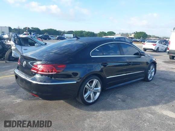 2016 Volkswagen CC Sport with VIN WVWBP7AN8GE502338, listed as a IAAI auction lot 41535048 with 71,645 mi miles. Bid and sale history available at carsss.com. Image 4.