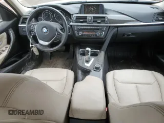 2013 BMW 3 Series 320i xDrive with VIN WBA3C3C59DF981328, listed as a Copart auction lot 57132395 with 152,458 mi miles and Salvage title. Bid and sale history available at DreamBid. Image 8.
