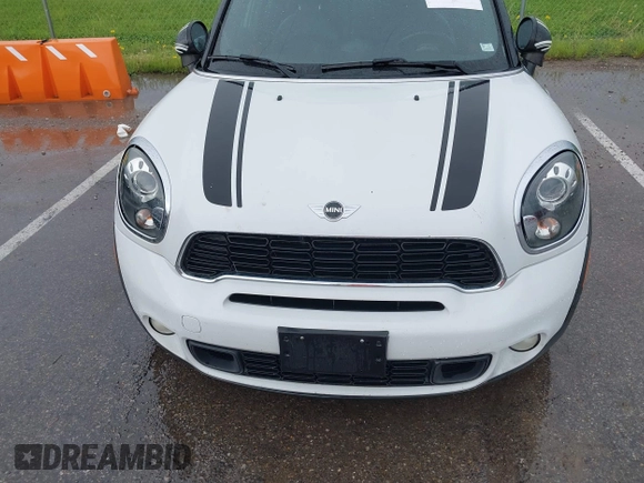 2013 MINI Countryman S ALL4 with VIN WMWZC5C5XDWP31652, listed as a IAAI auction lot 42127716 with 82,601 mi miles and . Bid and sale history available at DreamBid. Image 6.