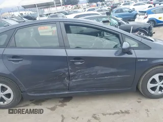 2013 Toyota Prius One z VIN JTDKN3DU4D5677392, wystawiony jako IAAI lot #42050842 z przebiegiem 169 732 mil mil oraz . Historia ofert i sprzedaży dostępna na DreamBid. Obrazek 13.