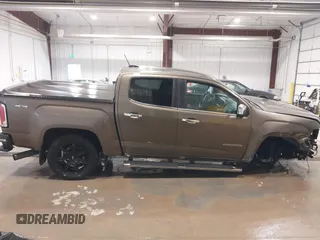 2016 GMC Canyon 4WD SLT z VIN 1GTP6DE13G1229783, wystawiony jako IAAI lot #41583360 z przebiegiem 80 149 mil mil oraz . Historia ofert i sprzedaży dostępna na DreamBid. Obrazek 14.