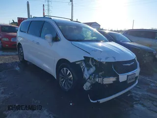 2021 Chrysler Pacifica Touring L z VIN 2C4RC1BG5MR527476, wystawiony jako IAAI lot #41410422 z przebiegiem 105 673 mil mil oraz . Historia ofert i sprzedaży dostępna na DreamBid. Obrazek 1.