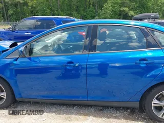 2018 Ford Focus SE with VIN 1FADP3FE8JL238024, listed as a IAAI auction lot 42463643 with Not provided miles and . Bid and sale history available at DreamBid. Image 14.