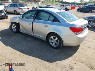 2014 Chevrolet Cruze 1LT with VIN 1G1PC5SBXE7320337, listed as a IAAI auction lot 42010404 with 69,270 mi miles and . Bid and sale history available at DreamBid. Image 3.