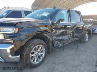 2019 Chevrolet Silverado 1500 LTZ with VIN 1GCPWEED4KZ102552, listed as a IAAI auction lot 41479603 with 104,913 mi miles. Bid and sale history available at carsss.com. Image 6.