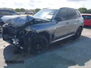 2025 BMW X5 M60i with VIN 5UX33EU03S9X62019, listed as a IAAI auction lot 41623189 with 5,749 mi miles. Bid and sale history available at carsss.com. Image 2.