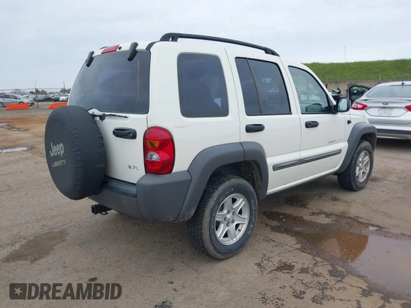 2002 Jeep Liberty Sport with VIN 1J4GL48K92W268896, listed as a IAAI auction lot 41788687 with 102,706 mi miles. Bid and sale history available at carsss.com. Image 4.