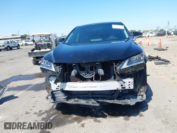 2016 Lexus RX 350 z VIN 2T2BZMCA6GC002373, wystawiony jako IAAI lot #42356683 z przebiegiem 107 067 mil mil oraz . Historia ofert i sprzedaży dostępna na DreamBid. Obrazek 13.