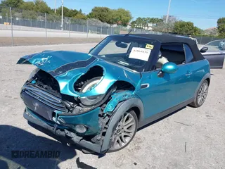 2016 MINI Convertible z VIN WMWWG5C5XG3A83276, wystawiony jako IAAI lot #41864830 z przebiegiem 103 721 mil mil oraz . Historia ofert i sprzedaży dostępna na DreamBid. Obrazek 17.