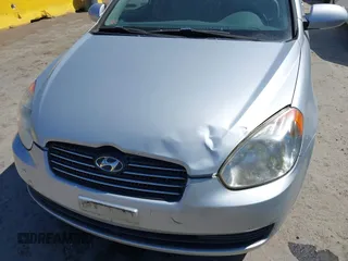 2007 Hyundai Accent GLS with VIN KMHCN46C57U087156, listed as a IAAI auction lot 42151298 with 81,588 mi miles. Bid and sale history available at carsss.com. Image 6.