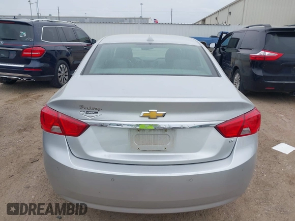 2014 Chevrolet Impala LT with VIN 2G1125S33E9101056, listed as a IAAI auction lot 41877161 with 130,757 mi miles and . Bid and sale history available at DreamBid. Image 17.