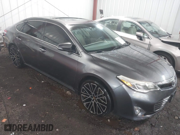 2015 Toyota Avalon Limited with VIN 4T1BK1EB6FU164773, listed as a IAAI auction lot 41877742 with 128,858 mi miles and . Bid and sale history available at DreamBid. Image 1.