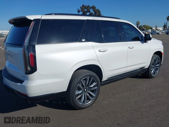 2023 Cadillac Escalade 4WD Sport z VIN 1GYS4FKL7PR286940, wystawiony jako IAAI lot #40702874 z przebiegiem 7 981 mil mil oraz . Historia ofert i sprzedaży dostępna na DreamBid. Obrazek 4.