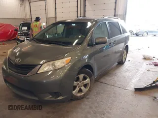 2011 Toyota Sienna LE AAS with VIN 5TDKK3DC1BS073077, listed as a IAAI auction lot 41916750 with 176,822 mi miles. Bid and sale history available at carsss.com. Image 2.