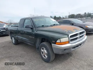 1997 Dodge Dakota with VIN 1B7GG23X1VS211394, listed as a IAAI auction lot 41723088 with 124,104 mi miles. Bid and sale history available at carsss.com. Image 1.