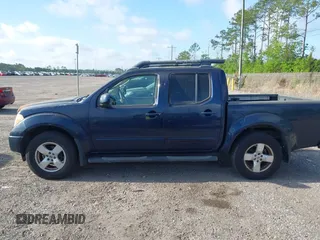 2007 Nissan Frontier SE with VIN 1N6AD07U67C465423, listed as a IAAI auction lot 41980928 with 212,287 mi miles and . Bid and sale history available at DreamBid. Image 14.