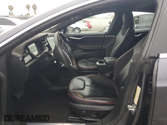 2014 Tesla Model S 60 with VIN 5YJSA1H10EFP60690, listed as a Copart auction lot 62515065 with 57,864 mi miles and Clean title. Bid and sale history available at DreamBid. Image 7.