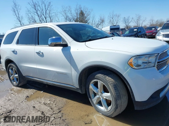 2013 Dodge Durango Citadel z VIN 1C4RDJEG6DC638023, wystawiony jako IAAI lot #41761307 z przebiegiem 405 864 mil mil oraz . Historia ofert i sprzedaży dostępna na DreamBid. Obrazek 13.