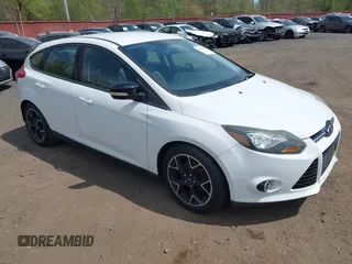 2013 Ford Focus SE with VIN 1FADP3K29DL182434, listed as a IAAI auction lot 42138008 with 103,072 mi miles. Bid and sale history available at carsss.com. Image 1.
