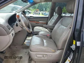 2010 Toyota Sienna XLE with VIN 5TDYK4CC2AS307940, listed as a Copart auction lot 64662065 with 275,846 mi miles and Clean title. Bid and sale history available at DreamBid. Image 7.
