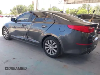 2015 Kia Optima EX z VIN 5XXGN4A7XFG497858, wystawiony jako IAAI lot #42156724 z przebiegiem 109 028 mil mil oraz . Historia ofert i sprzedaży dostępna na DreamBid. Obrazek 3.