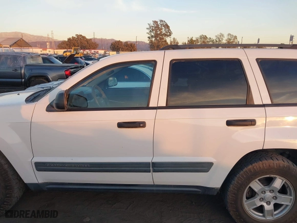 2006 Jeep Grand Cherokee Laredo with VIN 1J8GS48K16C348315, listed as a IAAI auction lot 41062772 with 239,662 mi miles. Bid and sale history available at carsss.com. Image 13.