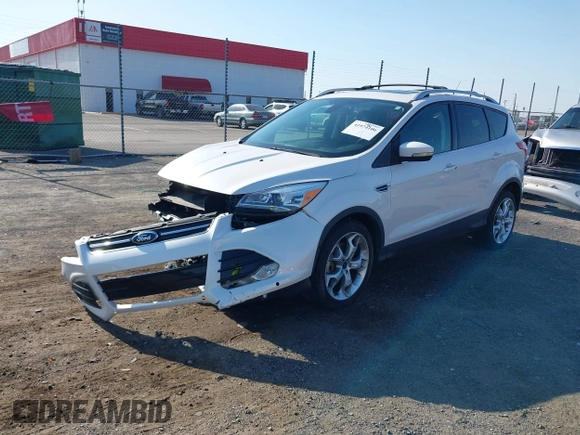2013 Ford Escape Titanium with VIN 1FMCU0J97DUA70393, listed as a IAAI auction lot 41974106 with 73,548 mi miles and . Bid and sale history available at carsss.com. Image 2.