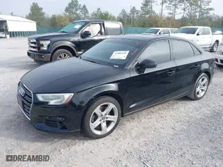 2017 Audi A3 Sedan Premium with VIN WAUAUGFF0H1059503, listed as a IAAI auction lot 41882348 with 121,258 mi miles. Bid and sale history available at carsss.com. Image 2.