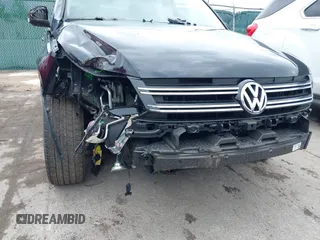2016 Volkswagen Tiguan S с VIN WVGBV7AXXGW546743, выставлен на аукционе IAAI как лот 42234403 с пробегом 43 344 миль миль и . История ставок и продаж доступна на DreamBid. Изображение 6.