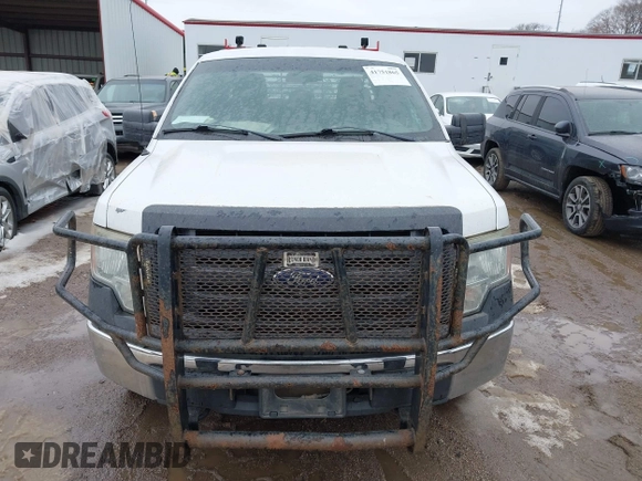 2012 Ford F-150 XL z VIN 1FTFX1EF7CKE39326, wystawiony jako IAAI lot #41751865 z przebiegiem 212 133 mil mil oraz . Historia ofert i sprzedaży dostępna na DreamBid. Obrazek 12.