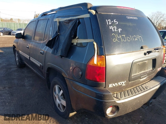 2005 GMC Envoy SLE with VIN 1GKET16SX56139511, listed as a IAAI auction lot 41234171 with Not Provided miles and . Bid and sale history available at DreamBid. Image 3.