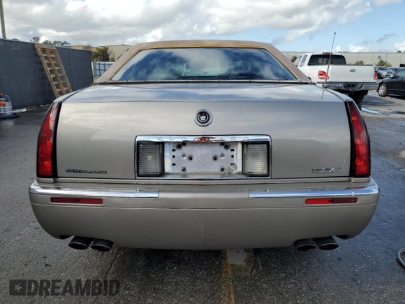2000 Cadillac Eldorado z VIN 1G6EL12Y7YB703863, wystawiony jako Copart lot #85433244 z przebiegiem 175 416 mil mil oraz Szkoda całkowita • Salvage title. Historia ofert i sprzedaży dostępna na DreamBid. Obrazek 6.