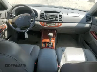 2005 Toyota Camry LE with VIN 4T1BF32K85U614653, listed as a Copart auction lot 52860195 with 156,675 mi miles and Salvage Title. Bid and sale history available at DreamBid. Image 8.