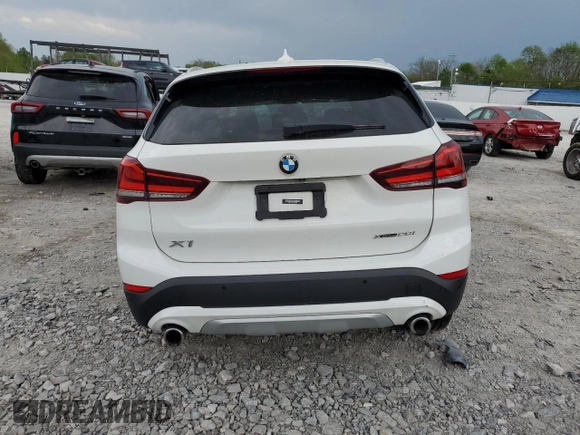 2021 BMW X1 xDrive28i z VIN WBXJG9C02M5S69998, wystawiony jako Copart lot #54782065 z przebiegiem 48 211 mil mil oraz Szkoda całkowita • Salvage title. Historia ofert i sprzedaży dostępna na DreamBid. Obrazek 6.