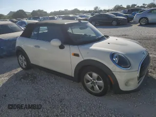 2019 MINI Convertible Cooper with VIN WMWWG5C59K3D01832, listed as a Copart auction lot 87505905 with 42,666 mi miles and Non repairable. Bid and sale history available at DreamBid. Image 4.