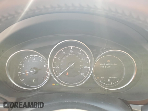 2018 Mazda CX-5 Grand Touring z VIN JM3KFADM5J1420690, wystawiony jako Copart lot #56897875 z przebiegiem 46 483 mil mil oraz Szkoda całkowita • Salvage title. Historia ofert i sprzedaży dostępna na DreamBid. Obrazek 9.