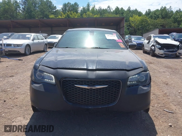 2015 Chrysler 300 with VIN 2C3CCABG1FH807740, listed as a IAAI auction lot 40246268 with 174,037 mi miles. Bid and sale history available at carsss.com. Image 6.