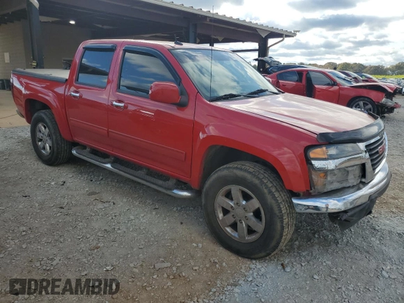 2012 GMC Canyon SLT with VIN 1GTH6NFE7C8105500, listed as a Copart auction lot 82255584 with 239,229 mi miles and Clean Title. Bid and sale history available at carsss.com. Image 4.