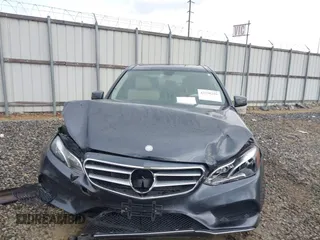 2014 Mercedes-Benz E 350 Sport with VIN WDDHF5KB7EA779952, listed as a IAAI auction lot 42308290 with 100,000 mi miles and . Bid and sale history available at DreamBid. Image 12.