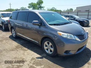 2015 Toyota Sienna LE AAS with VIN 5TDKK3DC4FS617903, listed as a IAAI auction lot 42390155 with 151,975 mi miles and . Bid and sale history available at DreamBid. Image 1.