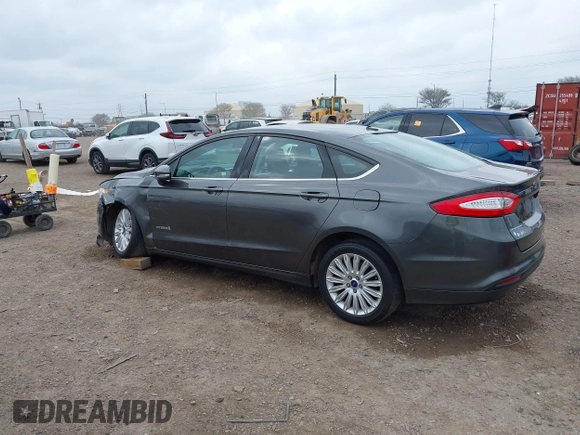 2016 Ford Fusion SE Hybrid with VIN 3FA6P0LU5GR235241, listed as a IAAI auction lot 41697504 with 165,510 mi miles. Bid and sale history available at carsss.com. Image 3.