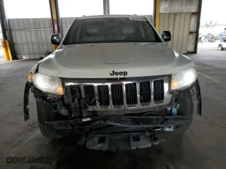 2012 Jeep Grand Cherokee Limited with VIN 1C4RJFBTXCC189998, listed as a Copart auction lot 87547735 with 207,167 mi miles and Salvage Title. Bid and sale history available at carsss.com. Image 5.