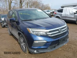 2016 Honda Pilot EX with VIN 5FNYF6H35GB014121, listed as a IAAI auction lot 41675592 with 129,362 mi miles. Bid and sale history available at carsss.com. Image 1.